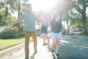 Young Family Walking in Winter Park Neighborhood Orlando Florid